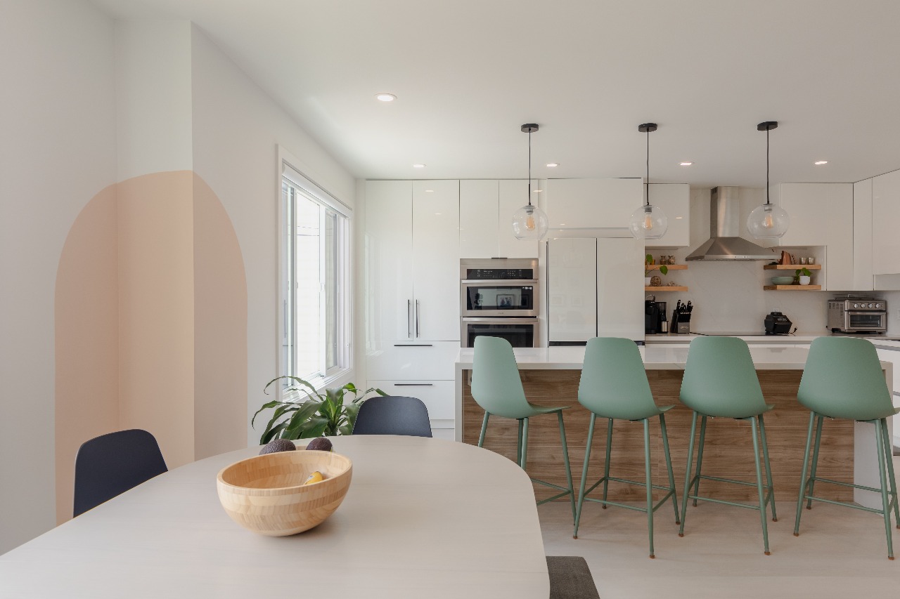 Kitchen and dining area with pendant lights in San Francisco full-house remodel