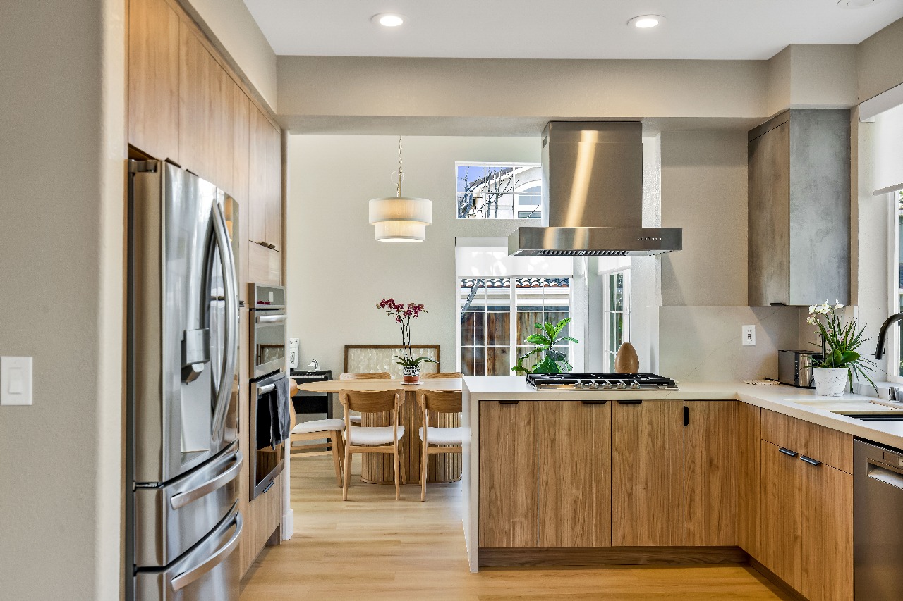 Kitchen with stainless steel appliances in Alameda full-house remodel